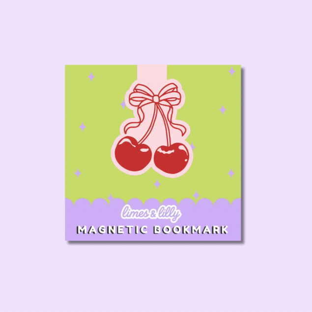 Magnetic bookmark with cherry design on a green and purple background
