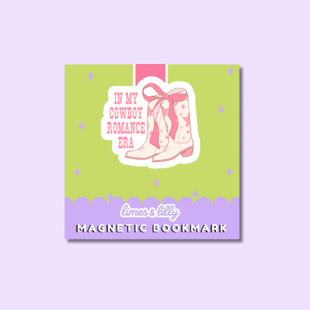 A square decorative magnetic bookmark with a pastel design, featuring a lime green upper section, a lavender lower band, and an illustration of cowboy boots with the text 'IN MY COWBOY ROMANCE ERA' and 'limes & lilly MAGNETIC BOOKMARK' at the bottom.