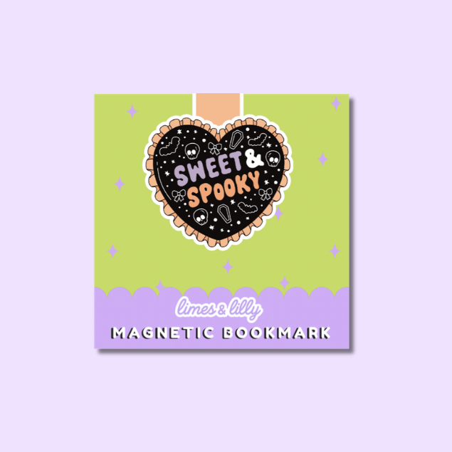 A square product card for a magnetic bookmark featuring a lime green top section, a lavender bottom band, and a central black heart graphic with the words “Sweet & Spooky” in orange and white. The card is centered on a light lavender background.