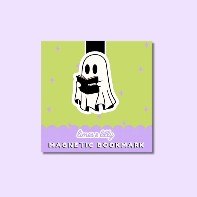 A square magnetic bookmark with a cute ghost illustration reading a book, shown on a light lavender background. The bookmark features a lime green top section with small star accents, a lavender bottom section, and the text 'limes & lily MAGNETIC BOOKMARK' in white.