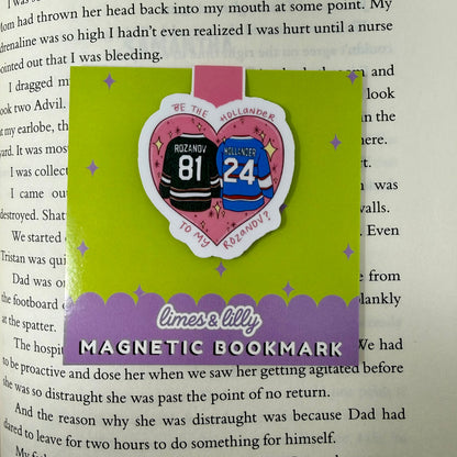 Magnetic bookmark with hockey-themed design on a book page