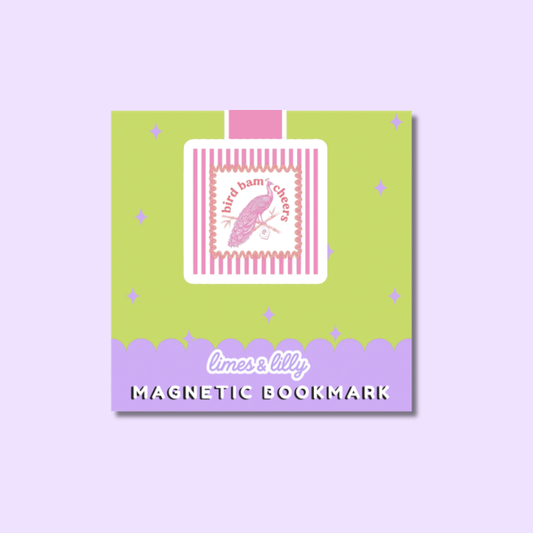 A square decorative magnetic bookmark card shown on a light lavender background. The card features a lime green upper section with pink star accents, a pink-and-white striped label illustration resembling a perfume bottle, and a lavender lower section with the text 'limes & lily' and 'MAGNETIC BOOKMARK'.