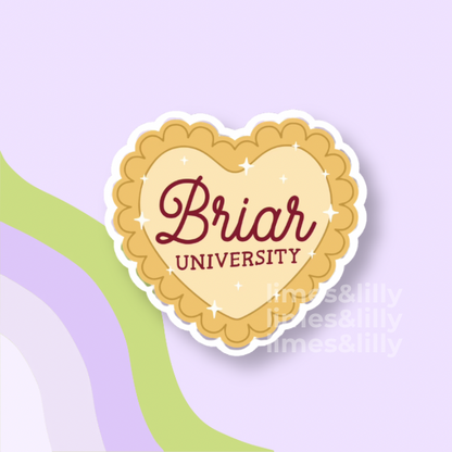 Heart-shaped sticker with 'Briar University' text on a light purple background