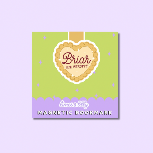 Magnetic bookmark with heart-shaped 'Briar University' logo on a green and purple background