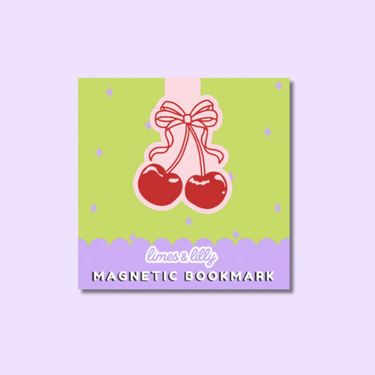 Magnetic bookmark with cherry design on a green and purple background