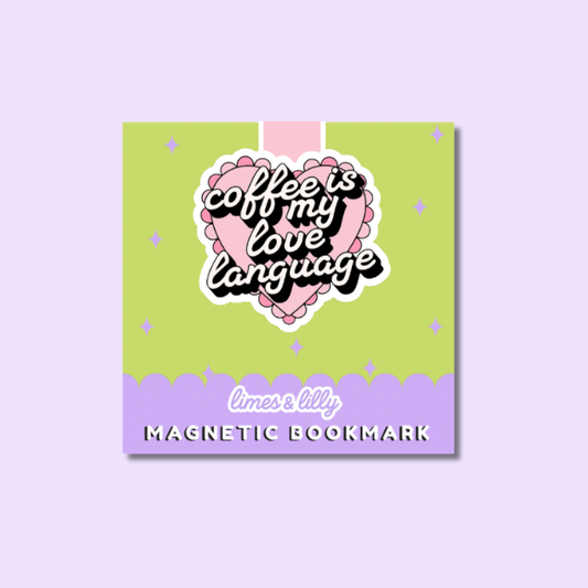 A square magnetic bookmark with a pastel design, featuring a lime green top section, a lavender bottom band, and a central pink heart with the phrase 'coffee is to my love language' in black script. The brand name 'limes & lily' is printed at the bottom.