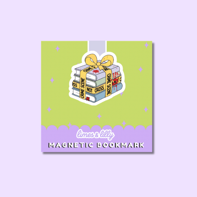 A square product card for a magnetic bookmark featuring an illustrated stack of books with autumn leaves and the title 'Soda Shoppe,' plus the text 'limes & lilys' and 'MAGNETIC BOOKMARK.' The card is centered on a pale lavender background.