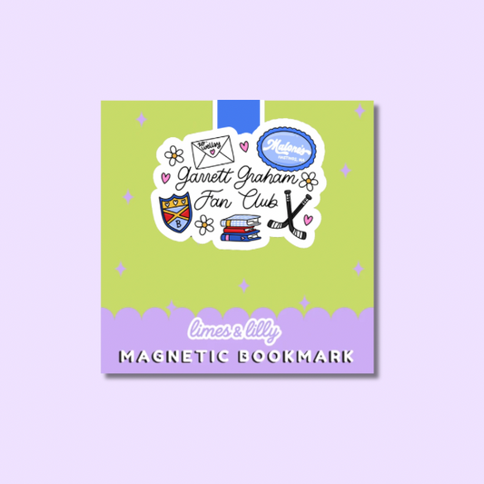 Magnetic bookmark with stickers on a green and purple background