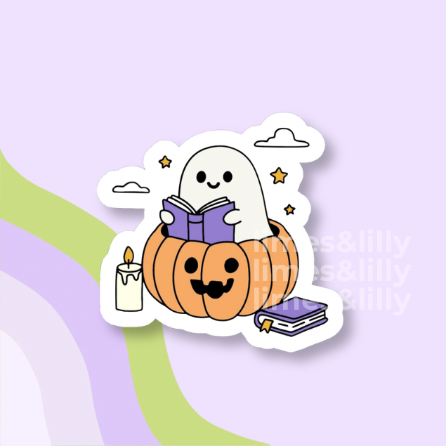 A die-cut sticker featuring a cute cartoon illustration of a white ghost sitting on an orange jack-o'-lantern pumpkin and reading a purple book, with a white candle and a small purple notebook nearby, shown on a pastel lavender background with abstract curved stripes.