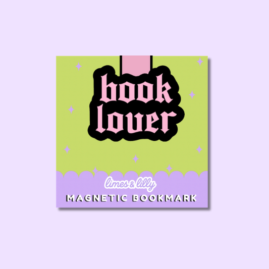 A square magnetic book bookmark with a pastel design, featuring a lime green top section, a lavender bottom section, and a pink-and-black 'book lover' text graphic in the center. The words 'limes lilly' and 'MAGNETIC BOOKMARK' are printed on the item.