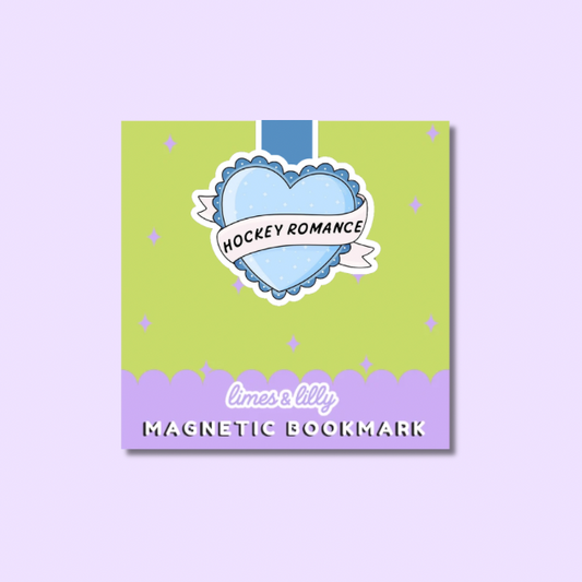 Magnetic bookmark with heart design and text on a green and purple background