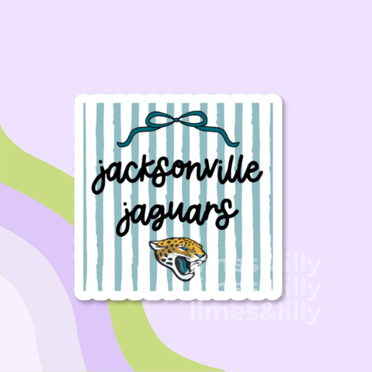 A square sticker with scalloped edges featuring light blue and white vertical stripes, the text 'jacksonville jaguars' in black script, a dark blue bow illustration, and the Jacksonville Jaguars logo, shown on a pastel purple background with abstract green and lavender shapes.