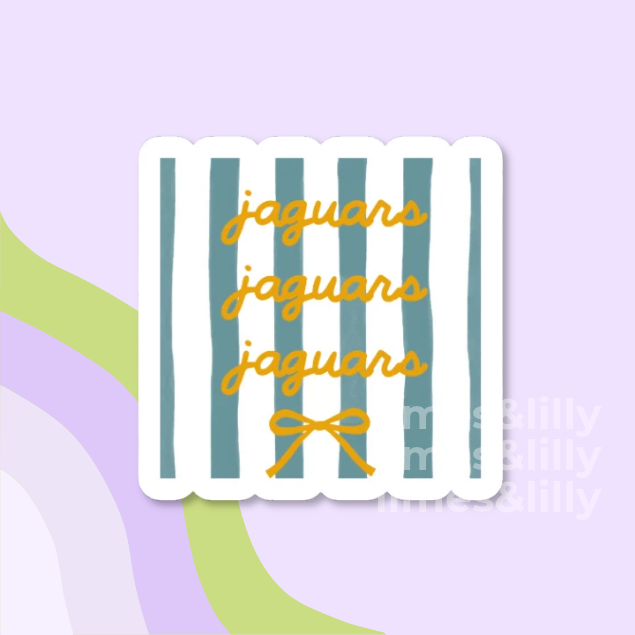 A die-cut sticker with a white background and vertical teal stripes, featuring the word 'jaguars' repeated in yellow script and a small yellow bow at the bottom, shown on a pastel lavender background with abstract green and lavender shapes.