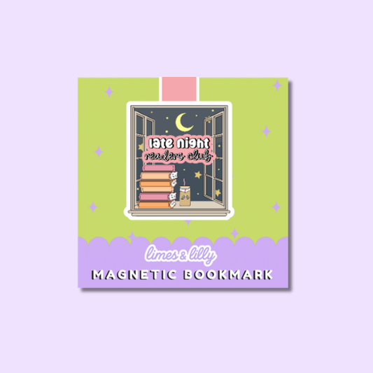 A square decorative product card centered on a pale lavender background, featuring a cartoon illustration of an open window with stacked books, stars, a crescent moon, and the text 'late night reader club.' Below the illustration, the card reads 'limes & lily' and 'MAGNETIC BOOKMARK,' indicating the product is a magnetic bookmark.
