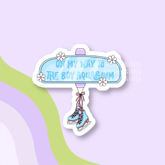 Sticker with ice skates and text 'On my way to the boy aquarium' on a light purple background
