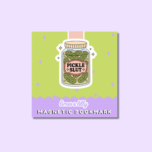 A square magnetic bookmark featuring a cartoon pickle jar illustration with the words “PICKLE SLUT” on the label, set on a lime green background with a lavender bottom band reading “limes & lily MAGNETIC BOOKMARK.”.