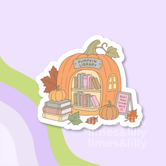 A die-cut sticker featuring an autumn-themed cozy reading scene with a chair, fireplace, books, pumpkins, and the text 'cozy readers BOOK CLUB escape into autumn pages.' The sticker is shown on a pastel lavender background with abstract green and lavender curved shapes.