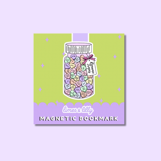 A square magnetic bookmark featuring a pastel illustration of a mason jar filled with heart-shaped candies, on a lime green background with a lavender bottom banner reading 'limes lilly MAGNETIC BOOKMARK'.