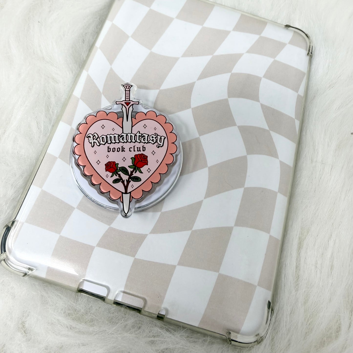 Phone case with a 'Romantic Book Club' design on a checkered background