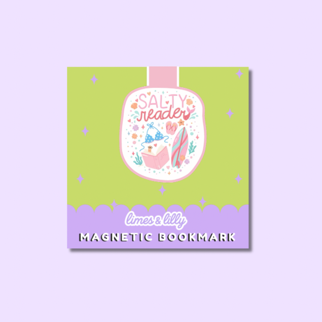 A square product card for a magnetic bookmark featuring a whimsical illustration. The card has a light green center with a pink and lavender scalloped bottom border, and a central illustration of a book character with the words 'SALTY reader'.