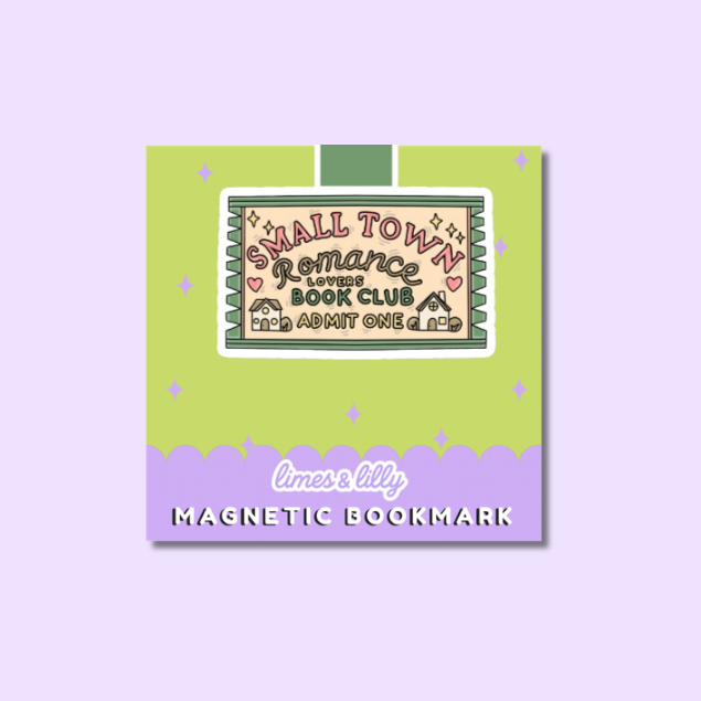 A square decorative package or card for a magnetic bookmark, shown on a pale lavender background. The package is lime green on top and lavender purple on the bottom, with a central illustrated label reading 'Small Town Romance Book Club Admit One' and the text 'limes & lily MAGNETIC BOOKMARK' near the bottom.