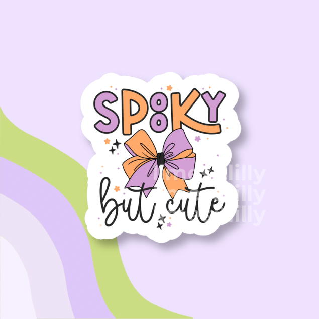 A die-cut sticker with the text 'SP8KY but cute' and a purple-and-orange bow illustration, shown on a pastel lavender background with abstract curved stripes.
