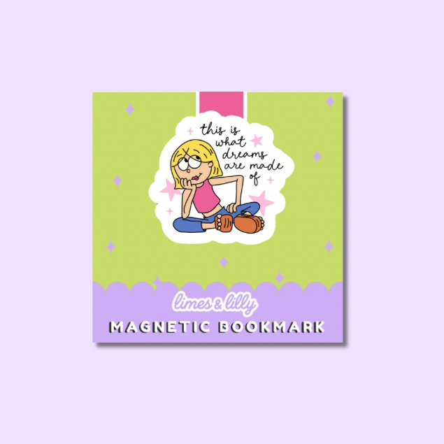 A square magnetic bookmark with a pastel design, featuring a cartoon girl with blonde hair and the text 'this is what dreams are made of' on a lime green background, with a lavender bottom section reading 'limes & lily MAGNETIC BOOKMARK'.