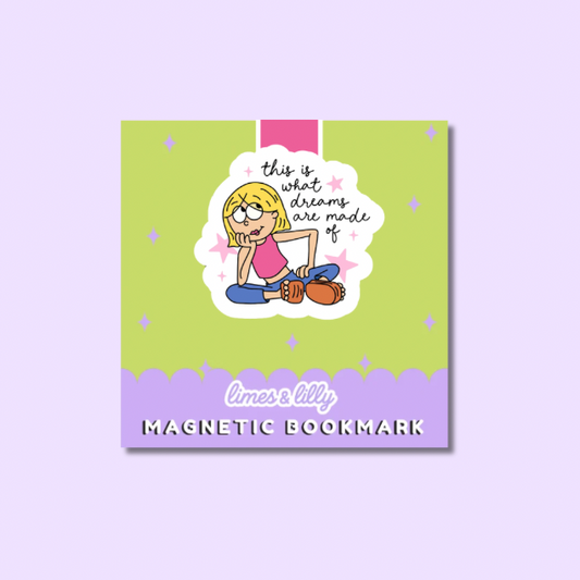 A square magnetic bookmark with a pastel design, featuring a cartoon girl with blonde hair and the text 'this is what dreams are made of' on a lime green background, with a lavender bottom section reading 'limes & lily MAGNETIC BOOKMARK'.