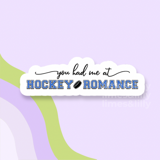 Sticker with 'you had me at Hockey Romance' text on a light purple background