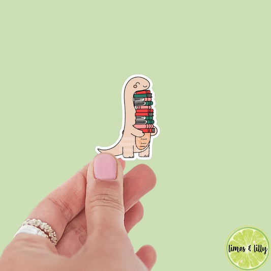 Dinosaur Holding Giant Book Stack Vinyl Sticker | Book Sticker | Bookish Stickers | Kindle Stickers | Book Lover | Trendy Stickers